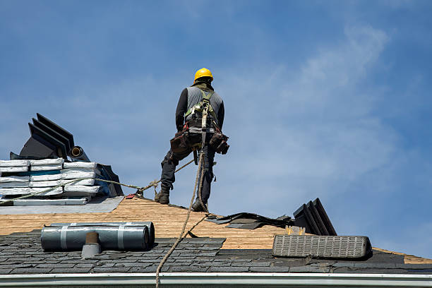 Professional Storm Damage Roof Repair technician working in Versailles, CT
